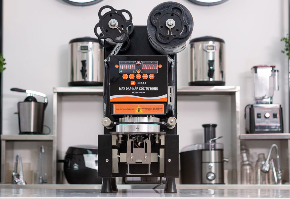 Máy dập nắp cốc tự động Unibar UB-99 - Hàng chính hãng