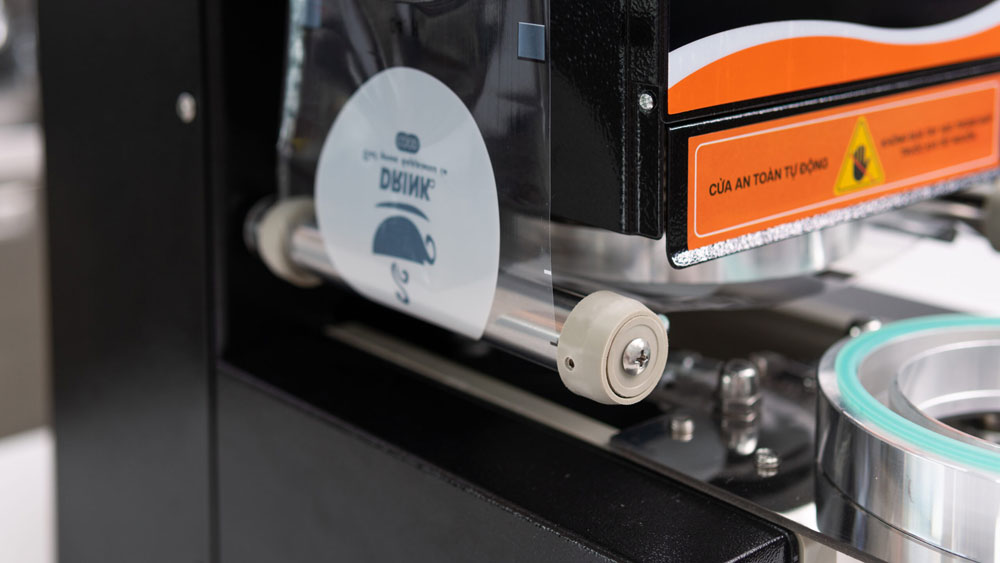 Máy dập nắp cốc tự động Unibar UB-99 - Hàng chính hãng