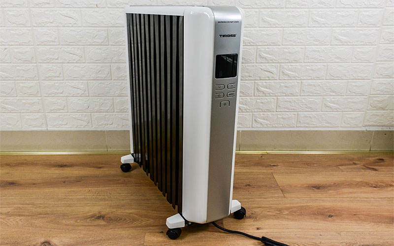 Máy sưởi dầu 12 thanh Tiross TS9218 - Hàng chính hãng