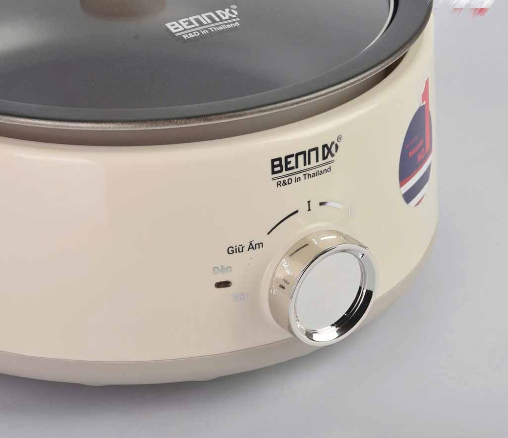 Núm xoay điều chỉnh nhiệt, thao tác đơn giản, dễ dùng cho mọi lứa tuổi.