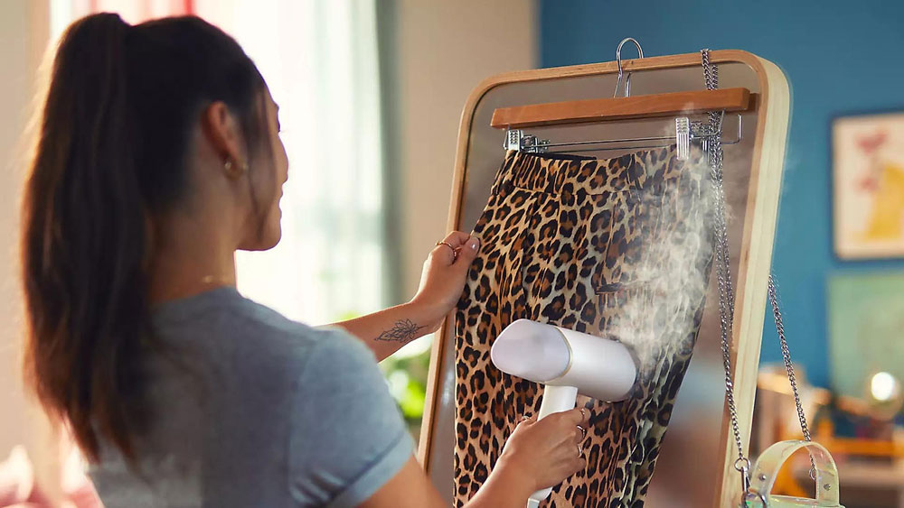 Bàn ủi hơi nước cầm tay Philips STH3020/10 - Hàng chính hãng