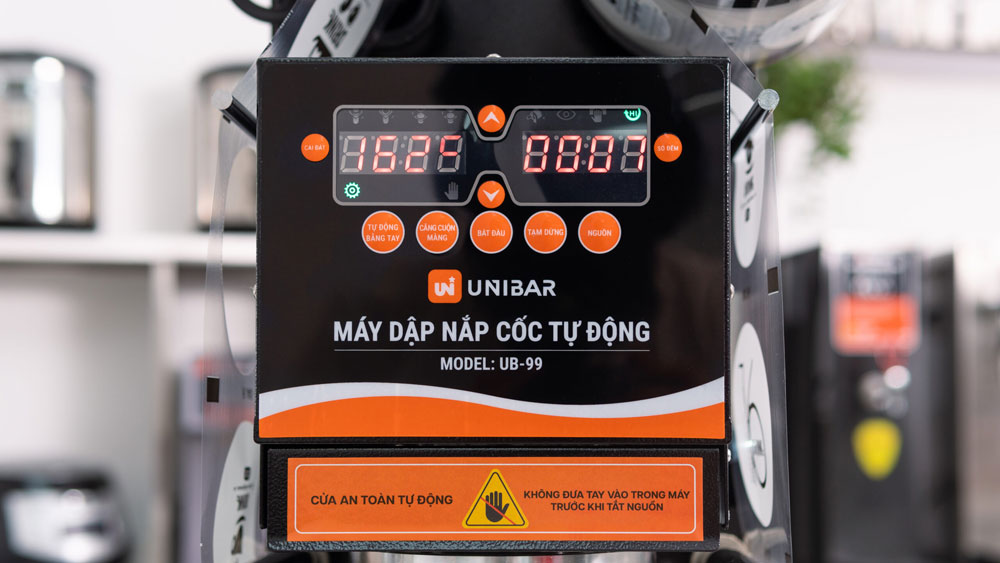Máy dập nắp cốc tự động Unibar UB-99 - Hàng chính hãng